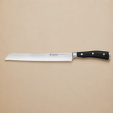 CUCHILLO ASSERRADO PARA PAN CLASSIC IKON 23CM WUSTHOF