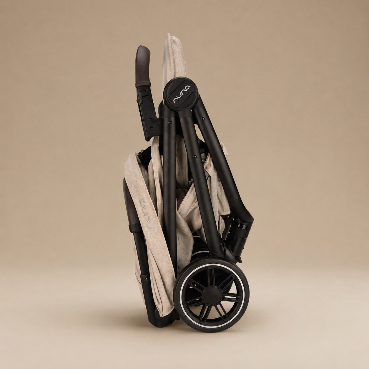 COCHE PARA BEBÉ ULTRALIGERO NUNA TRVL BISCOTTI