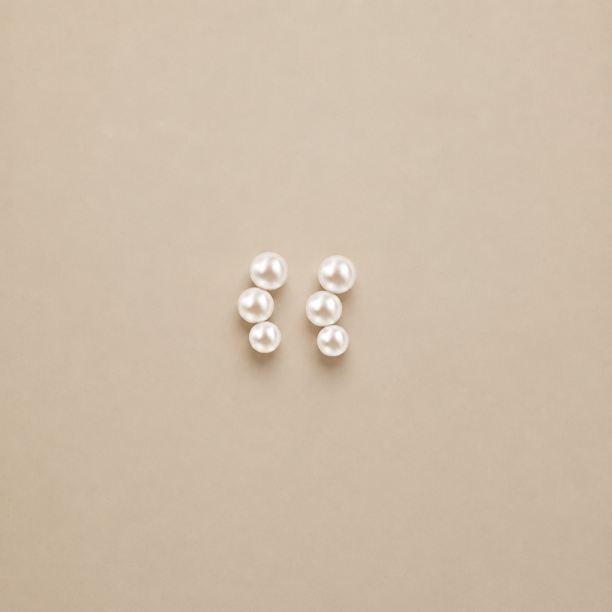 aretes-de-tres-perlas-1.png