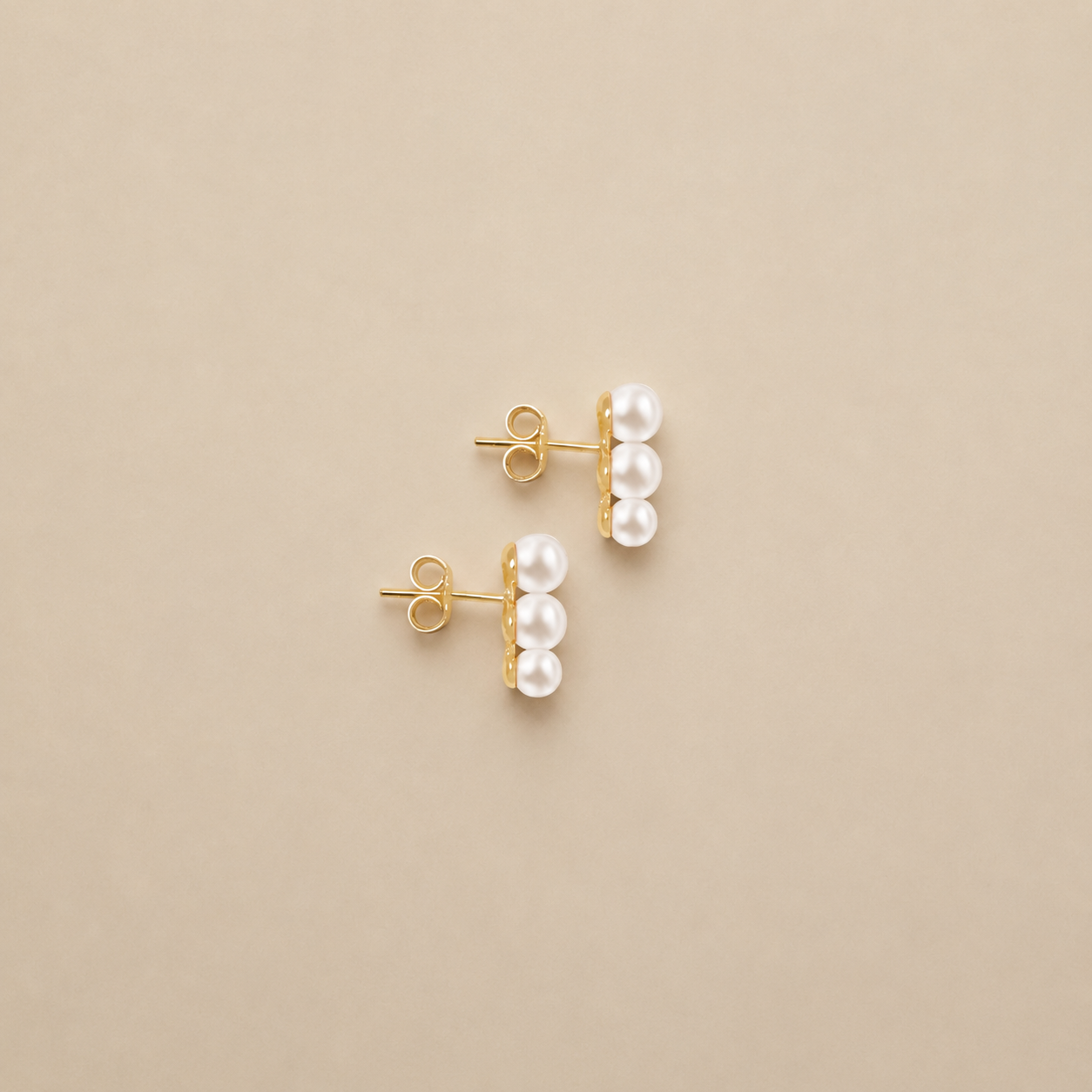 aretes-de-tres-perlas-2.png