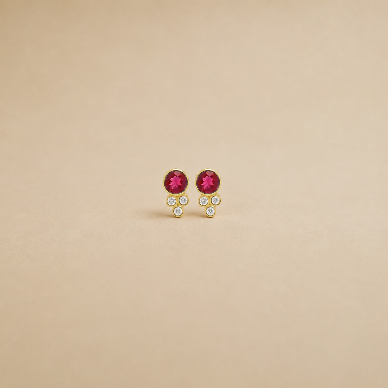aretes-media-bola-con-rubi-1.png