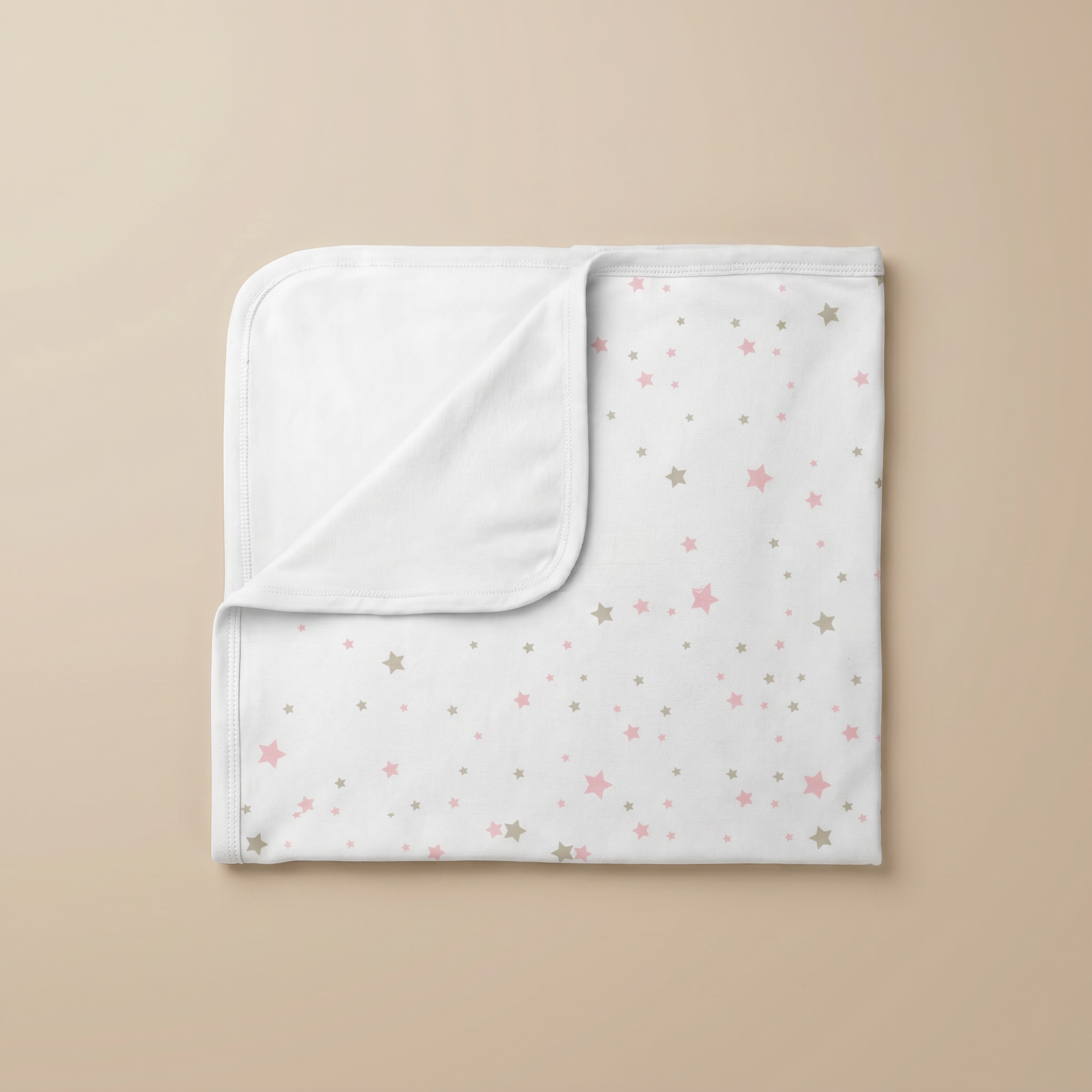 MANTA PIMA CON PLUSH ESTRELLAS ROSA CON BEIGE