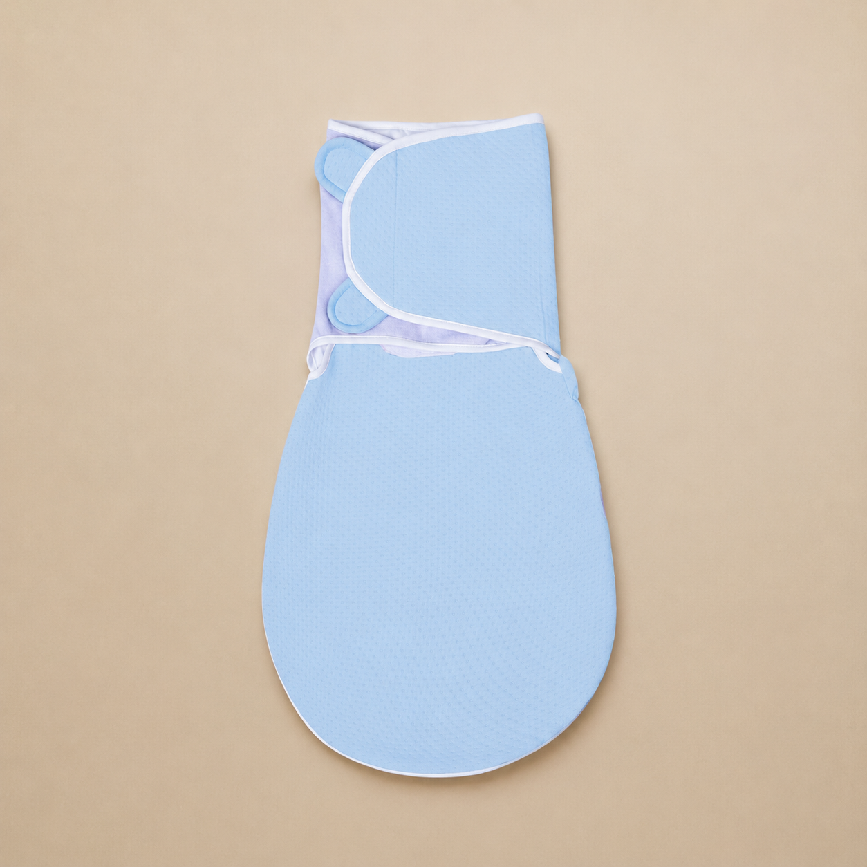 swaddle-jacquard-celeste_54427468-520b-4c4b-8c35-4d9034f792c6.png
